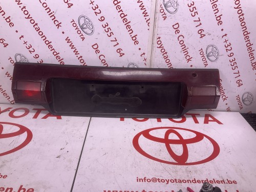 Kentekenplaathouder/reflector Corolla (E9) ‘87-‘92 Liftback